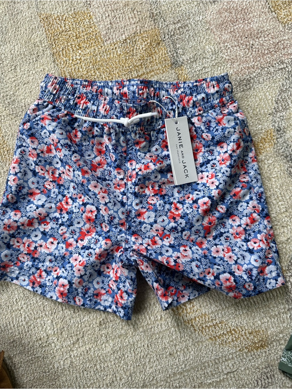 Janie and Jack Blue Floral Swim Trunks with Coral Accents
